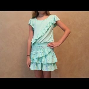 Teal shirt and skirt outfit